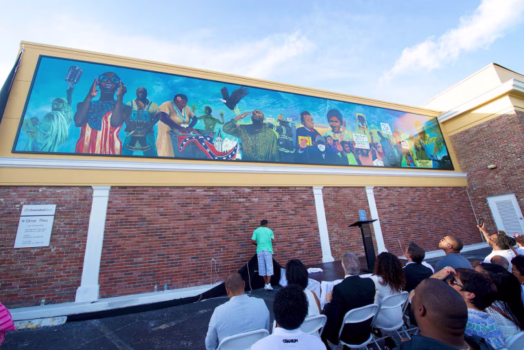 The OneUnited Mural Project and the landmark mural, Thunder & Enlightening, by muralist Addonis Parker