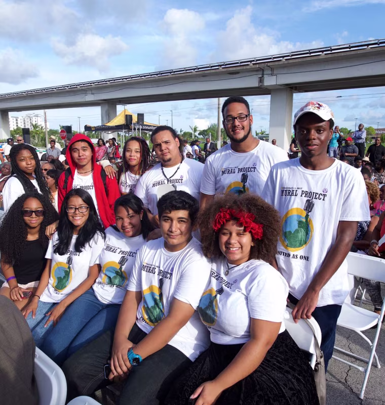 OneUnited mural apprentices.