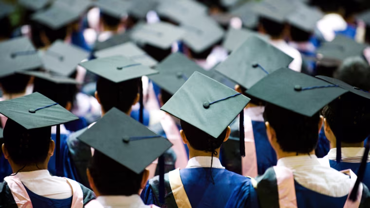 Students in caps and gowns