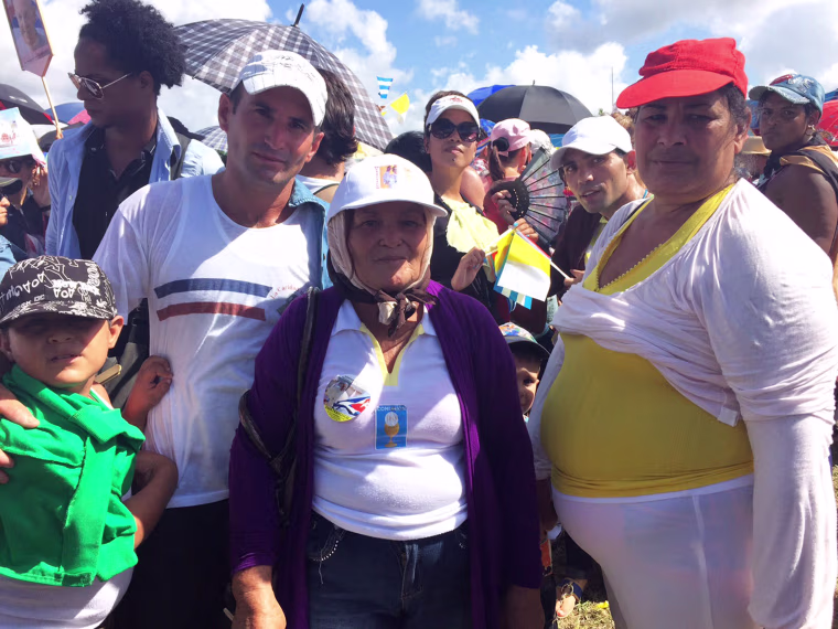 Image: Inocencia Montoya and her family at the mass to meet Pope in Holguin