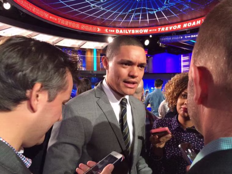 Trevor Noah answering questions after the unveiling of his new set of "The Daily Show."