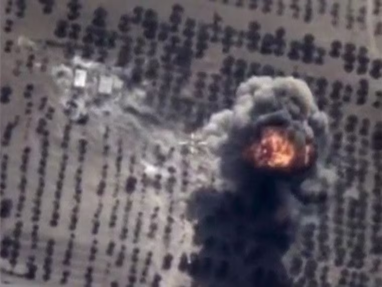 Image: Frame grab taken from Russia's Defence Ministry footage shows explosion in Idlib province, Syria