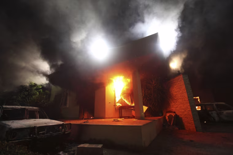 Image: File of the U.S. Consulate in Benghazi is seen in flames during a protest