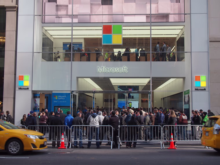 People wait outside the Microsoft flagship store on its opening day.