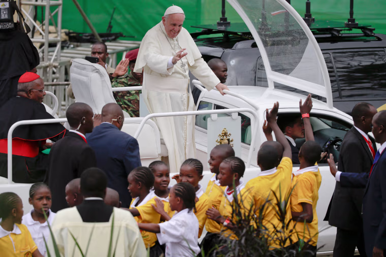 Image: Pope Francis arrives to celebrate Mass