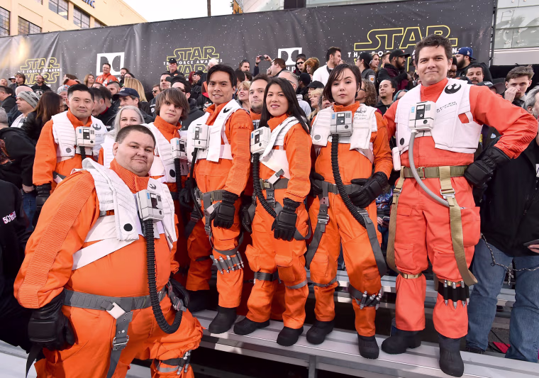 Image: Fans dressed in character wait in the stands
