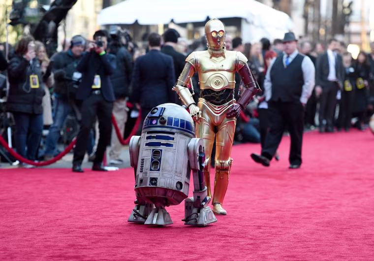 Image: Film characters R2-D2 (L) and C-3PO