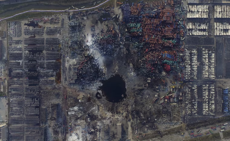 Image: An aerial picture of the site of explosions at the Binhai new district, Tianjin