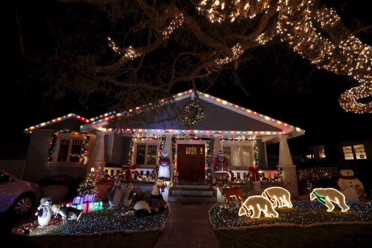 Image: Christmas lights are seen on a home in the Sleepy Hollow neighborhood of Torrance