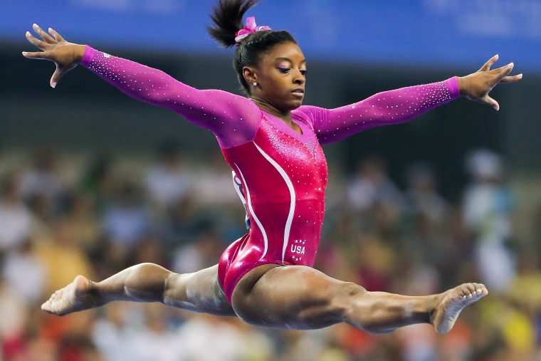 Image: Simone Biles operforms on the Balance Beam