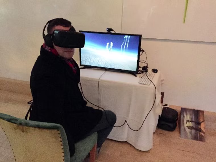Image: Reporter uses Oculus Rift headset as he tries out a virtual reality experience presented by The Dali Museum