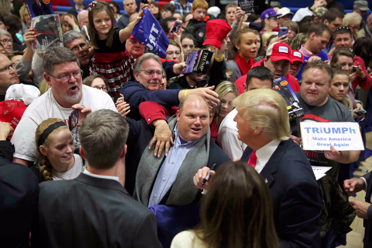 Image: Donald Trump is mobbed by supporters