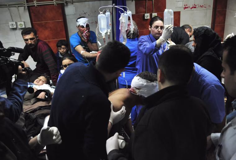 Image: Syria triple blast in Sayyida Zeinab