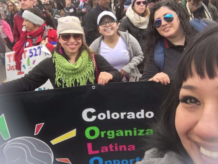 Picture taken with the COLOR staff, board, program participants and volunteers who were marching as part of this year's annual MLK Day "Marade."