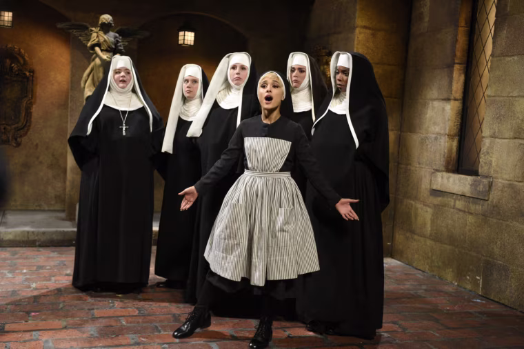 Image: Ariana Grande performs a sketch as she hosts Saturday Night Live