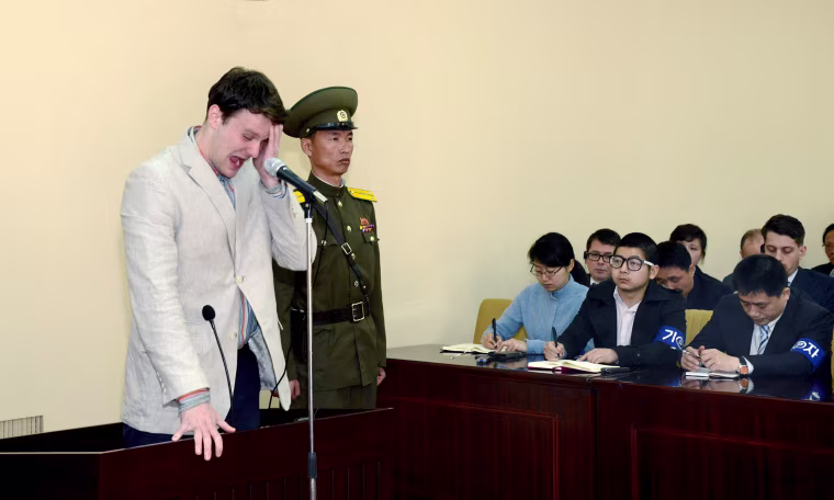 Image: U.S. student Otto Warmbier cries at court in an undisclosed location in North Korea