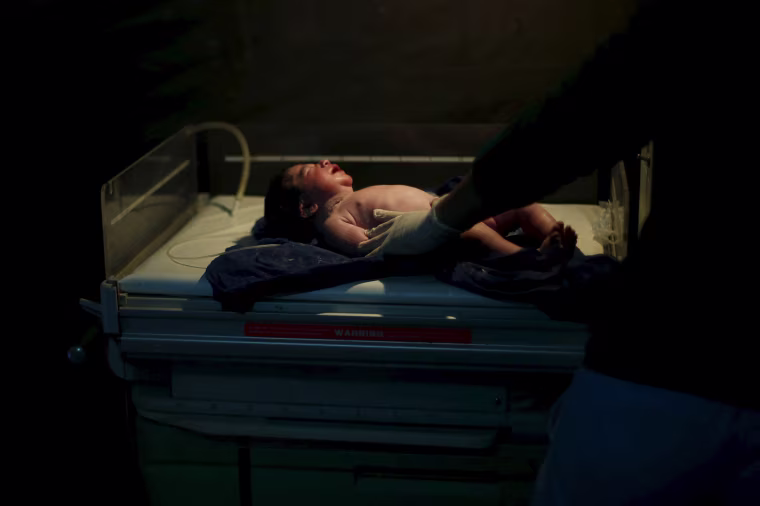 Image: The Wider Image: Born in a refugee camp