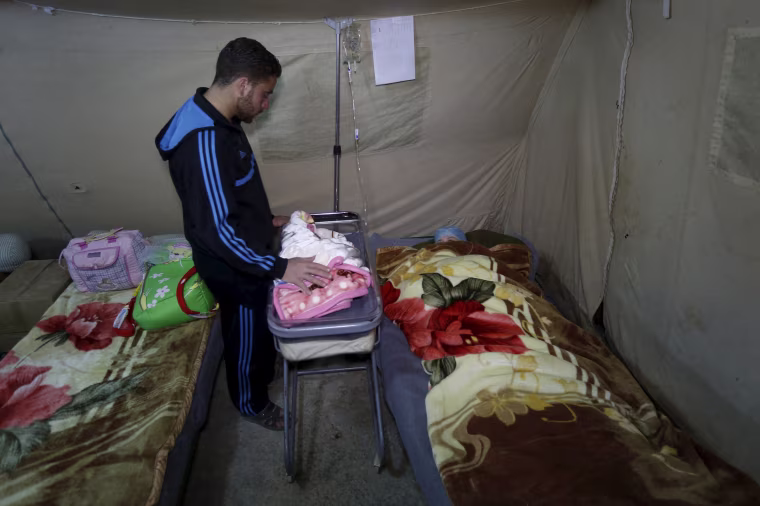 Image: The Wider Image: Born in a refugee camp