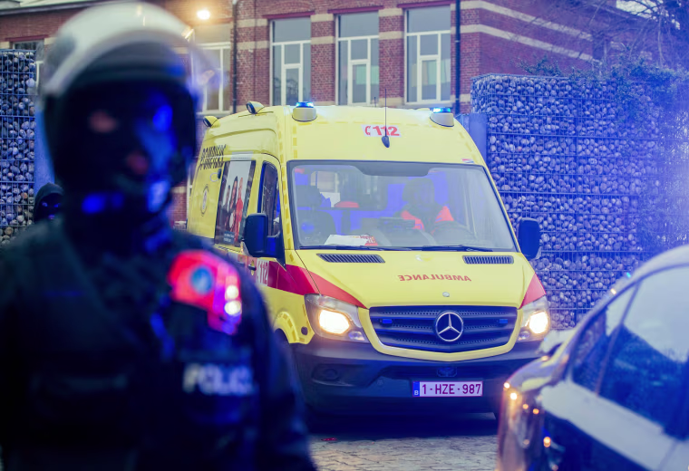 Image: Police raid on terror suspects in Brussels suburb