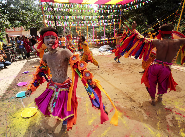 Image: Villagers celebrate holi