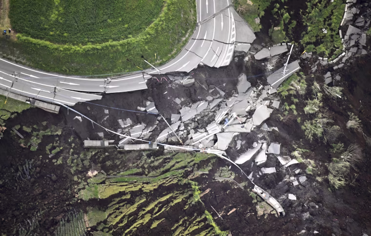 Image: A landslide caused by the earthquake destroys a road in Minamiaso