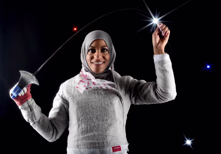 Fencer Ibtihaj Muhammad poses for a portrait (edited to add special effects) at the 2016 Team USA Media Summit at The Beverly Hilton Hotel on March 9, 2016 in Beverly Hills, California.