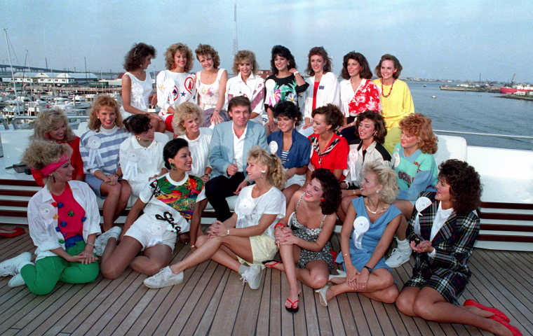 Image: Trump poses with about half of the competing State Misses on board his yacht in Atlantic City