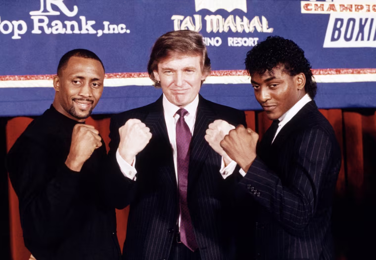 Image: Trump is flanked by super middleweight champion Thomas Hearns and Michael Olajide