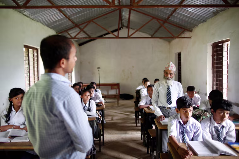 Image: The Wider Image: Nepal's 68-year-old student