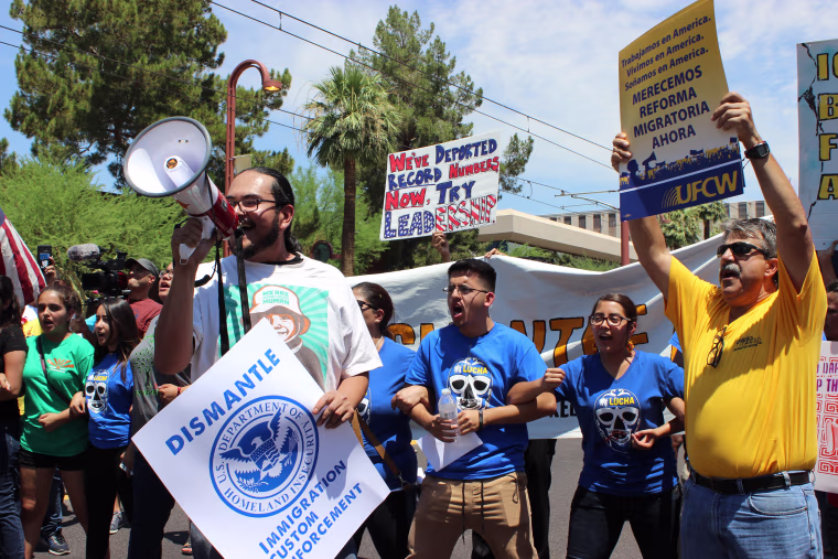 Dozens protested outside the U.S. Immigration and Customs Enforcement office in Phoenix hours after the U.S. Supreme Court issued a 4-4 ruling over President Obama's immigration plan.