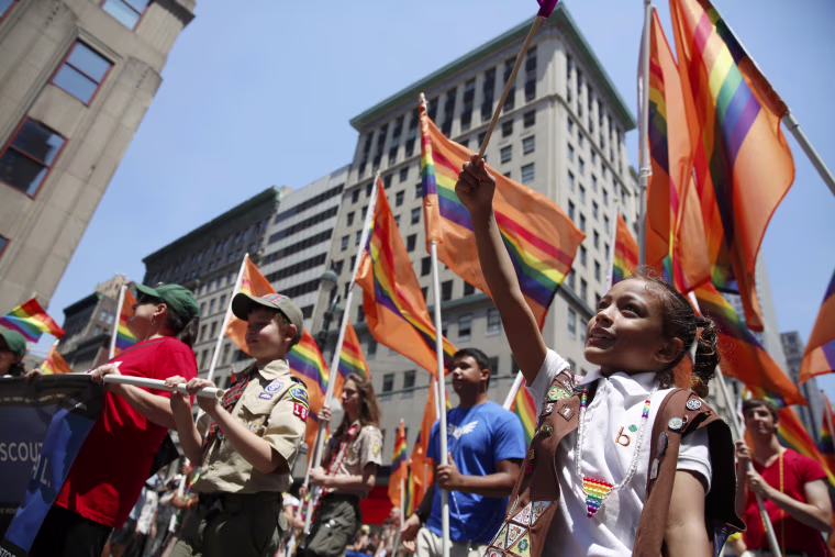 Image: People take part in the annual NYC Pride parade in New York City