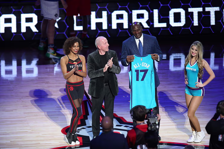 Charlotte Hornets owner and NBA Legend Michael Jordan receives a 2017 NBA All-Star jersey during the 2016 NBA All-Star Game on February 14, 2016 at the Air Canada Centre in Toronto, Ontario, Canada.