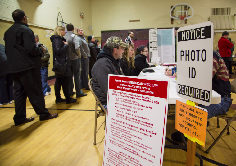 Image: Voters take to the polls in Wauwatosa, Wisconsin
