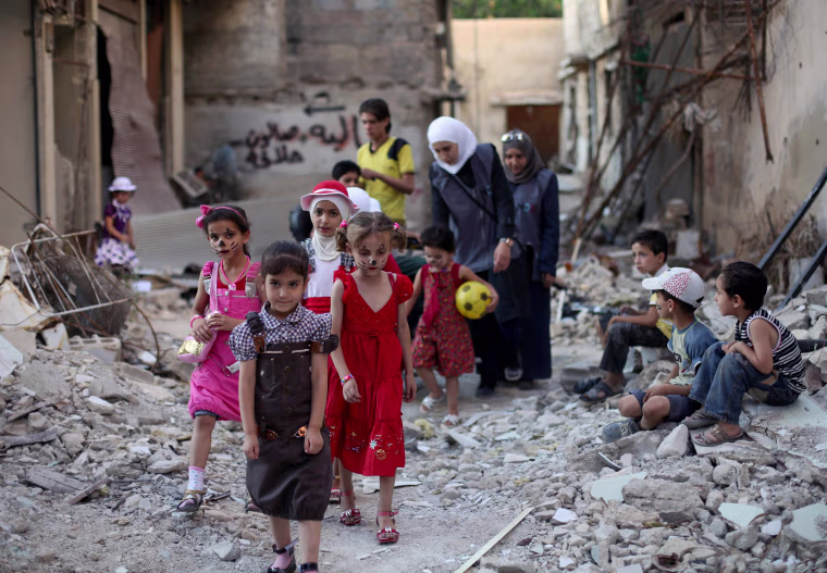 Image: SYRIA-CONFLICT-RELIGION-ISLAM-EID