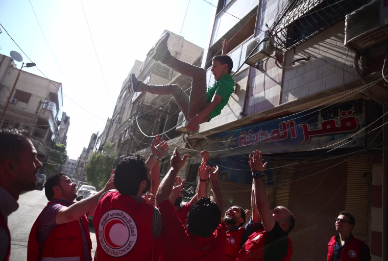 Image: SYRIA-CONFLICT-RELIGION-ISLAM-EID