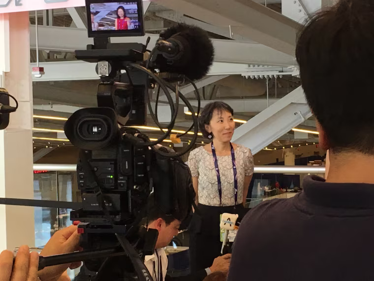 Lisa Shin, a delegate at the Republican National Convention, preparing to be interviewed by Korean-language media.