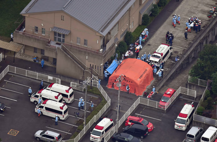 Image: An aerial view shows emergency members at a residential care facility