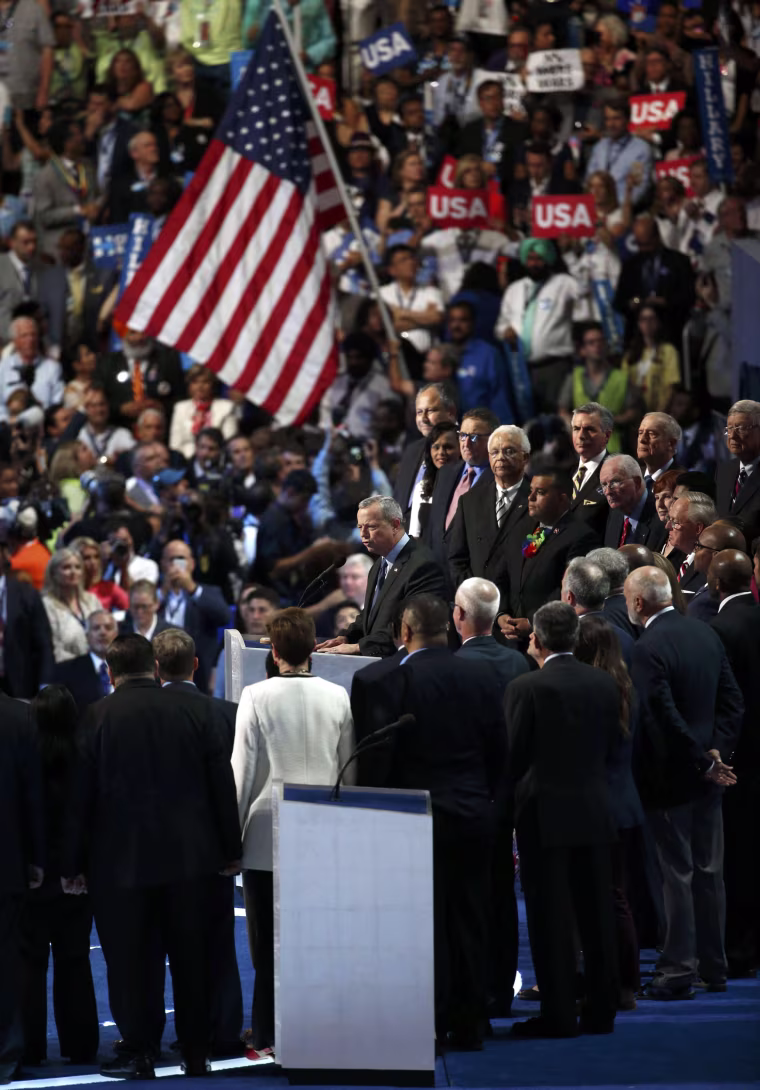 Image: Retired USMC General John Allen is joined by veterans while addressing at the Democratic National Convention in Philadelphia