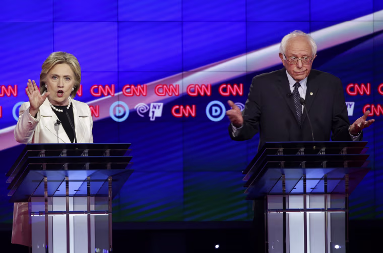 Image: Hillary Clinton and Bernie Sanders debate in Brooklyn