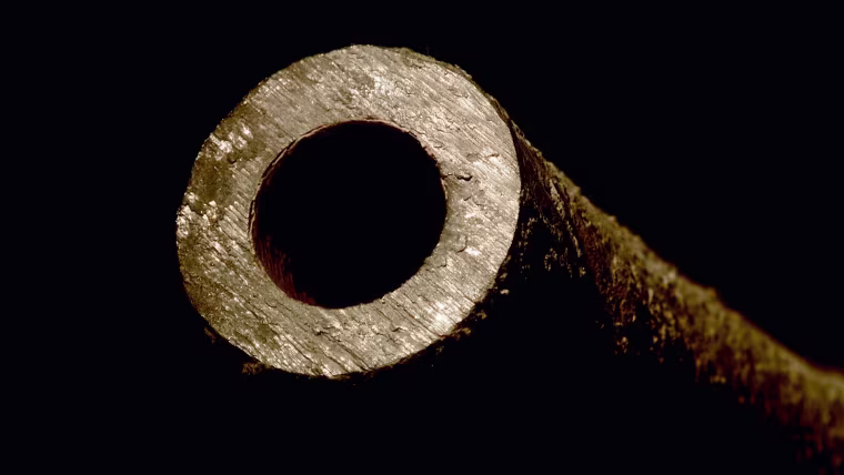 A close-up of a lead pipe pulled from underneath a New Orleans’ sidewalk. Lead was once widely used in a variety of industries, including paint and plumbing. Public health experts and agencies like the CDC now agree that there is no safe level of lead exposure for children. Lead service lines like this one can leach lead if exposed to corrosive water.