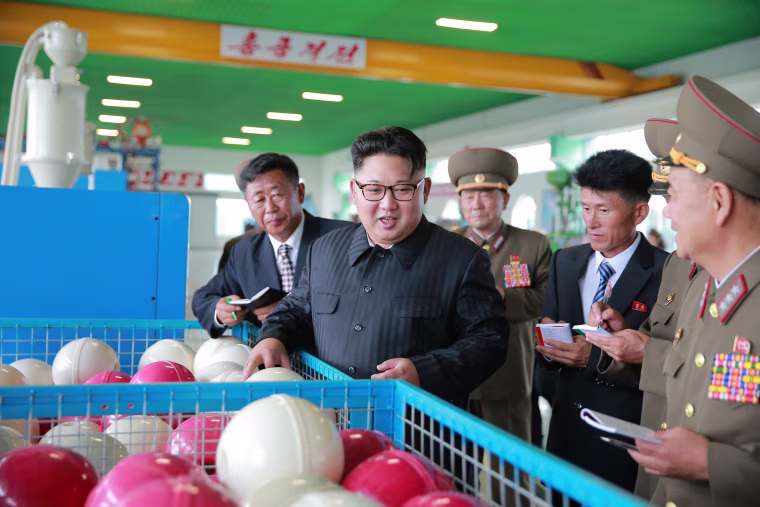Image: Kim Jong Un visits a factory in an image released on July 30, 2016