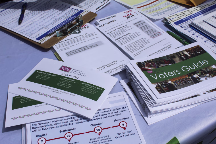 Image: Voter registration groups target Asian-Americans at a Hmong festival in St. Paul