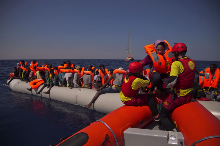 Image: Migrants from Nigeria fleeing Libya are rescued by emergency teams
