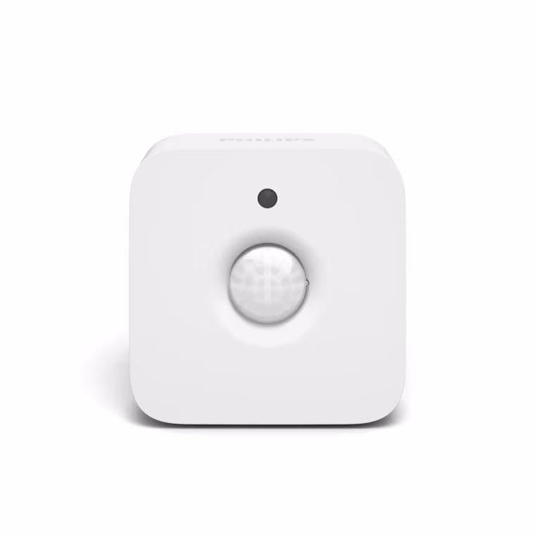 The Philips Hue freestanding motion sensor controls Hue connected lights and can sit on a bookshelf or table, or be mounted to a wall.