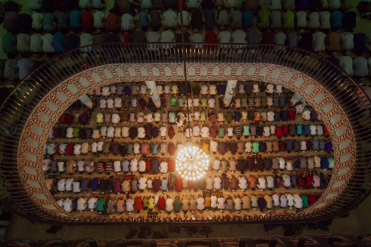 Image: Bangladeshi Muslims attend Eid al-Adha prayers at Baitul Mukarrom National Mosque