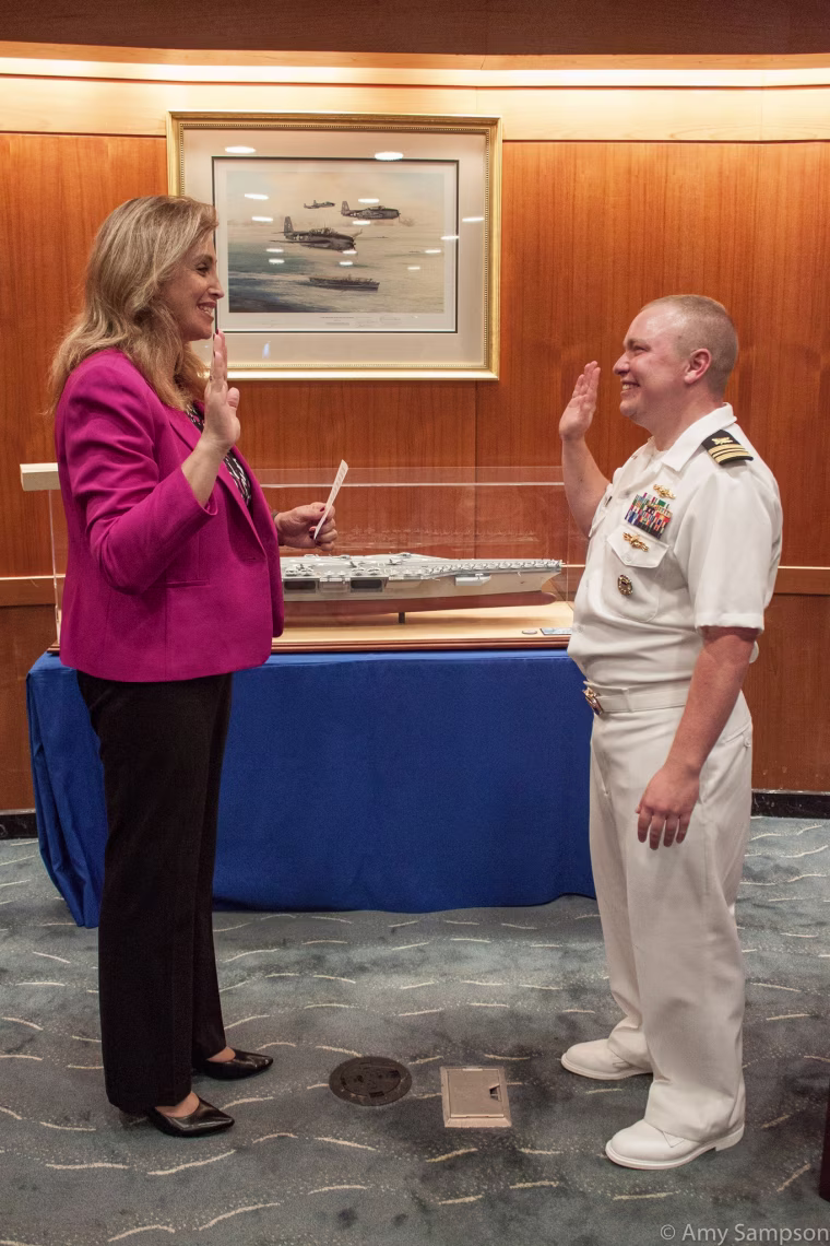 Deputy Assistant Secretary of Defense for Operational Energy Amanda Simpson (left) and Navy Lt. Cdr. Blake Dremann (right)