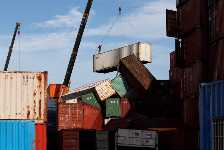 Image: Shipping containers toppled by strong winds of typhoon Meranti, are pictured in Kaohsiung