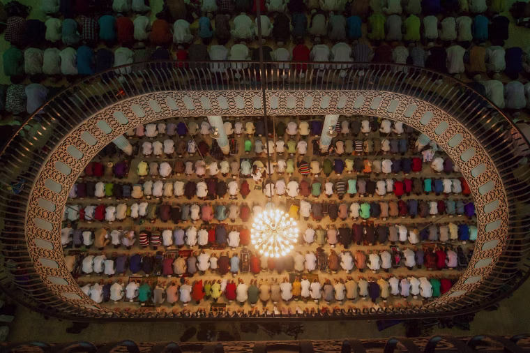 Image: Bangladeshi Muslims attend Eid al-Adha prayers at Baitul Mukarrom National Mosque