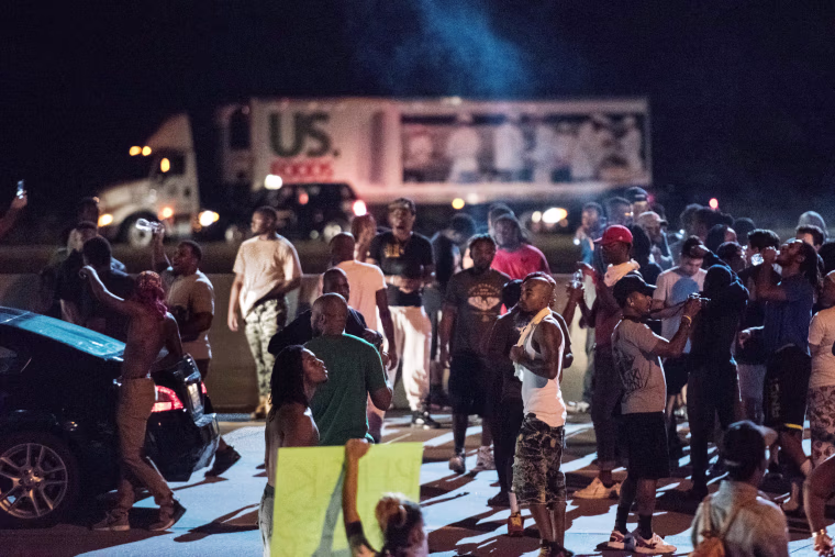Image: People block traffic on I-85 during protests