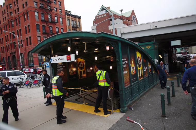 Image: Emergency workers gather outside the train station in Hoboken